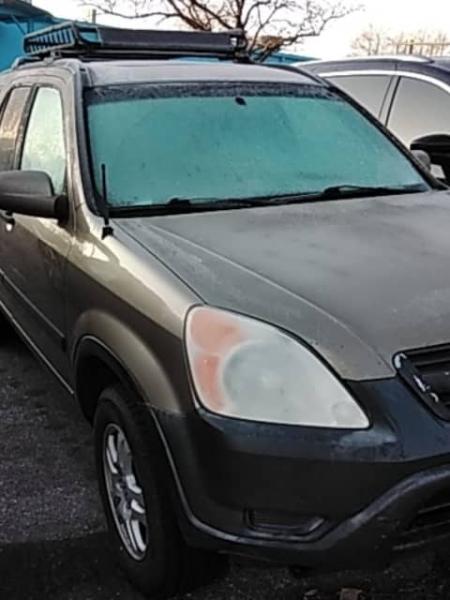2003 Honda CR-V needing headlight refinishing service